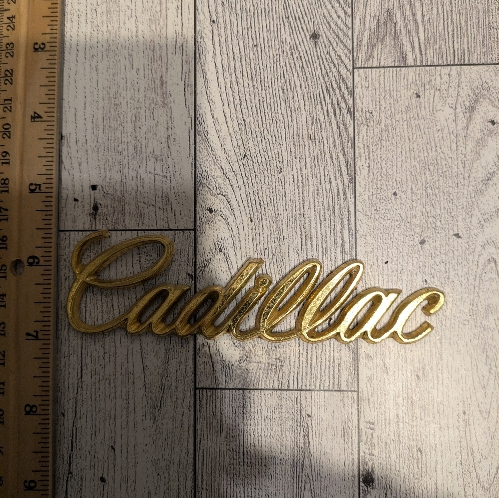 Cadillac Gold Emblem